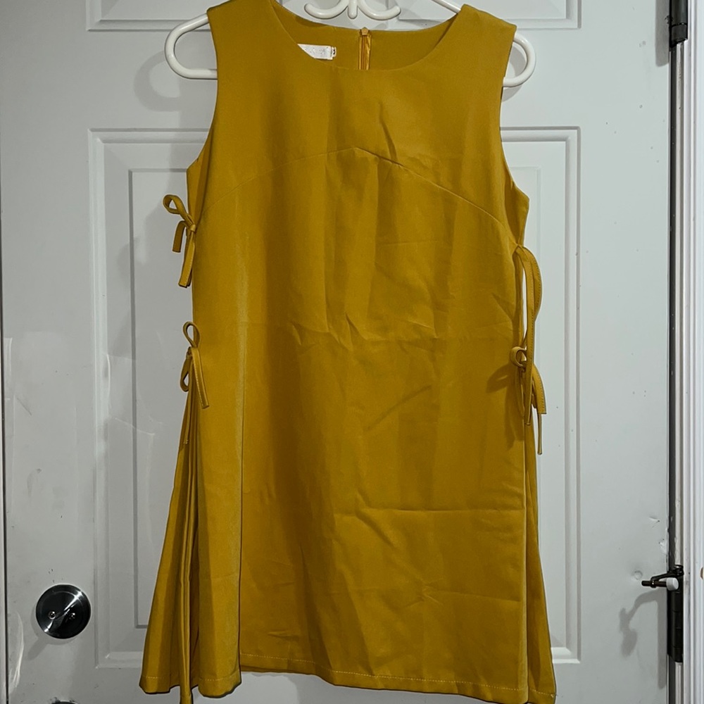 Mustard yellow shift dress with side pleats